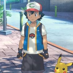 a person standing next to a pikachu on a sidewalk