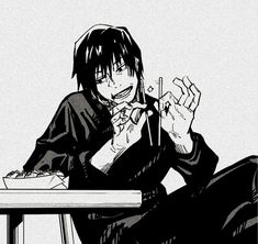 an anime character sitting at a table eating food