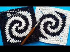 two square crocheted coasters with a wooden handled knitting needle in the middle