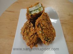 three fried food items on a white plate