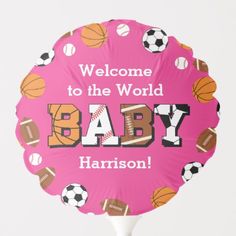 welcome to the world baby balloon with sports balls and soccers on it's pink background