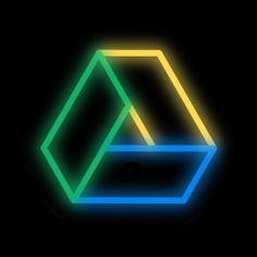 a neon sign with the shape of a hexagonal object in blue, yellow and green