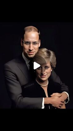 a man and woman are posing for a photo in front of a black background,