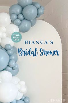 the bridal shower is decorated with blue and white balloons