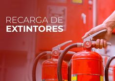 red fire extinguishers are lined up with the words recarga de exitintores