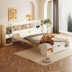 a white bed sitting on top of a wooden floor