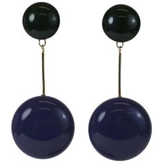 Striking and attractive, long Mod drop earrings in black and deepest eggplant resin. Made in Italy in the 1980's to resemble a 60's Mod style. Clip back fittings. Excellent condition. 1980's Italy. 3.5" long. 1.5" wide bottom drop. Top .75" width. Luxury Retro Earrings For Party, Luxury Retro Party Earrings, Cheap Retro Dangle Jewelry, Unusual Earrings 1stdibs, 70s Accessories Jewelry, 1960s Earrings, 60s Earrings, Jewelry Mood Board, 60s Jewelry