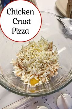 chicken crust pizza in a glass bowl on top of a kitchen scale with the words chicken crust pizza above it