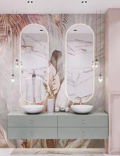 a bathroom with two sinks and mirrors in front of a palm tree wallpapered wall