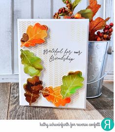 an autumn card with leaves on it