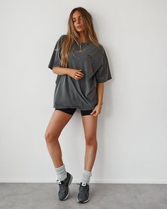 Oversized dropped shoulder Tee with Oldsport logo chest patch. COLOUR: Washed Black FABRIC: 100% mid-weight Cotton SIZING: Model is 5'9 and wearing L/XL Urban Oversized Washed Black Top, Oversized Gray Sportswear Top, Gray Urban Tops For Loungewear, Urban Style Gray Tops For Loungewear, Urban Gray Tops For Loungewear, Gray Urban Loungewear Top, Oversized Solid Color Sporty T-shirt, Oversized Solid Sporty T-shirt, Sporty Washed Black T-shirt With Relaxed Fit