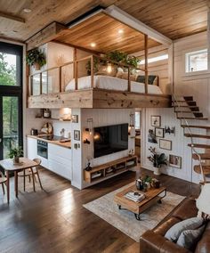 a living room filled with furniture and a fire place under a loft bed next to a window