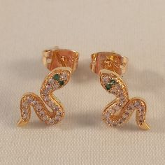 Beautifully Crafted Classic Design Zircon Snake Stud Earrings 18k Yellow Gold Filled W/Small Sparkling White + Emerald Green Simulated Diamond Topaz Zircon Gemstones. Top Quality, Brand New, Never Been Worn. Lead, Nickel Free. These Earrings Sparkle. Perfect Jewelry For Any Day, Special Occasion Gift Anniversary Banquet Dating Birthday Promise Prom Dance Holiday Party Christmas Stocking For Yourself Mom Women Sister Daughter Granddaughter Teen Or Friend. Free $18 Gift Of Your Choice In My Listin Fendi Earrings, Prom Dance, Gold Earrings For Women, Spring Earrings, Teardrop Dangle Earrings, Gemstone Stud Earrings, Beaded Drop Earrings, Sparkle Earrings, Green Gems