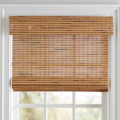 a bamboo blind in front of a window