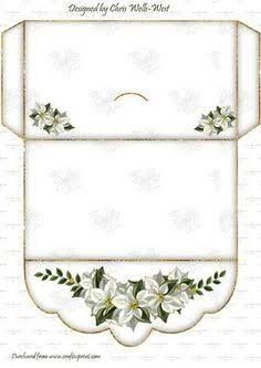 a white envelope with flowers and leaves on the inside, in gold trimmings