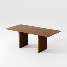 a wooden table sitting on top of a white floor