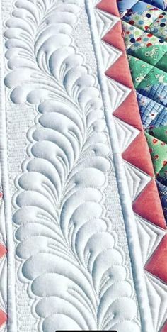 a close up of a quilted table runner