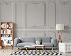 a living room with white walls and furniture