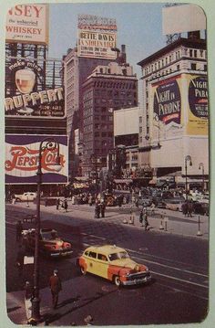 an old photo of a busy city street