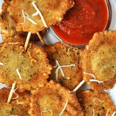 small appetizers with toothpicks and sauce on a plate