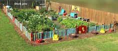 an aerial view of a garden in the backyard