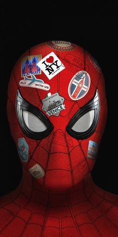 a spider man with many stickers on his face