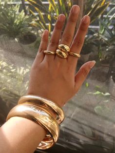 gold jewelry | gold chunky bangles bracelets | gold rings | smooth chunky gold rings and bangles Gold Chunky Jewelry, Gold Chunky Rings, Jewellery Stacking, Chunky Gold Rings, Chunky Bangles, Chunky Gold Bracelet, Nails Jewelry, Bangles Gold