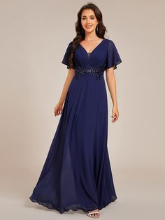 Elevate your evening look with this Elegant Pleated Short Sleeve Deep V-Neck Maxi Formal Evening Dress. Featuring a deep V-neckline and pleated detailing, this floor-length gown offers a sophisticated yet alluring silhouette. The short sleeves provide comfort while the fitted waist creates a flattering shape, making it perfect for formal events, galas, or weddings. Fit: Please refer to size chart. Length: Floor length. Sleeve Style: Short sleeves. Closure: It is concealed a zipper up the back. Undergarments: It is not padded, with lining. Fabric:The garment comprises chiffon. Stretch: Fabric is no stretch. Plus Formal Dresses, Be Unforgettable, Navy Blue Prom Dresses, Evening Maxi Dress, Short Sleeve Maxi Dress, Dress With Pleats, Prom Dresses Sleeveless, Chiffon Evening Dresses, Formal Evening Dress