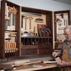 a man working in a woodworking shop