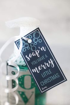 a bottle with a tag that says soap'n you have a merry little christmas