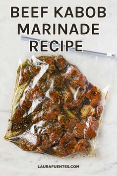 beef kabob marinade recipe in a clear plastic bag on a marble counter top