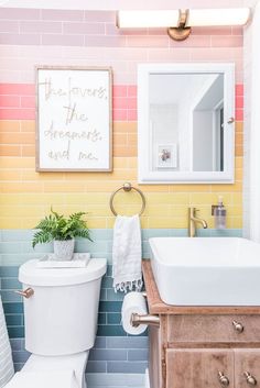 the bathroom with rainbow tile reveal is featured in an article about how to use it