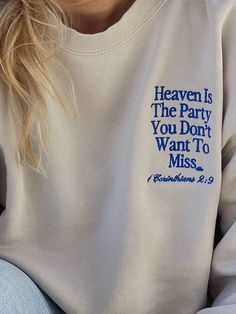 a woman wearing a sweatshirt that says heaven is the party you don't want to miss