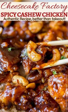 chicken and cashews on top of rice with chopsticks