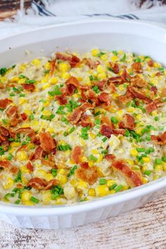 a casserole dish filled with corn and bacon