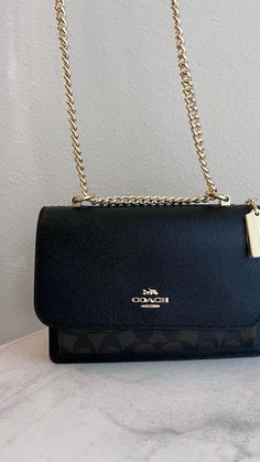 I love designer bags but unfortunately they can hurt the wallet a little too much. I’m starting my collection on the (physically) smaller end with this crossbody bag.

I love the gold elements along with the staple brown coach logo.

What is your favorite kind of purse? Let me know in the comments!

Follow me for more fashion & style inspo🤍

Purse | Handbag | Purse Essentials | Designer Purse | Purse Patterns | Purse Storage | Purse Inspo | Handbag Inspo | Purses and Bags | Cluth Purse | Crossbody Purse | Purse Outfit Style | Fanny Pack | Leather Bag | Backpack | Boho Purse | Aesthetic Purse | Crochet Purse | EBay Purse | EverHandmade | YSL | Gucci | Tory Burch | Kate Spade | The Tote Bag | Prada | Coach | Crossbody Purse | Tote Bag | Clutch | Bag | Marc Jacobs | Louis Vuitton | Coach Latest Coach Handbags, Vintage Tote Bag