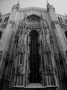 the large cathedral is very tall and has many windows