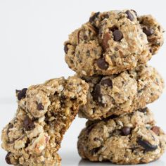 oatmeal cookies stacked on top of each other with chocolate chips in the middle