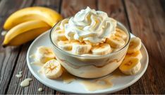 a banana and whipped cream dessert on a plate