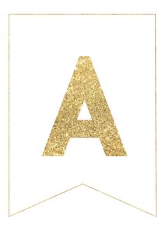 a gold glitter letter on white paper with the letter a in it's center