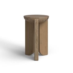 a small wooden stool with one leg extended and the other foot on it's side