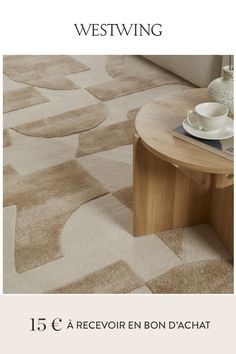 a coffee table sitting on top of a carpet covered floor