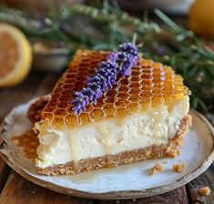 a piece of cheesecake with honey and lavender on top