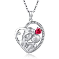 a heart shaped necklace with a mother and child in the center, surrounded by diamonds