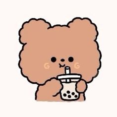 a brown teddy bear holding a drink in it's mouth