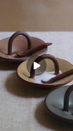 two plates with chocolate hearts on them sitting next to each other