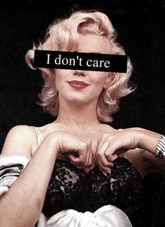 marilyn monroe with i don't care tape over her eyes and the words, i don't care