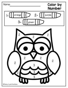 the color by number worksheet with an owl and two crayons on it