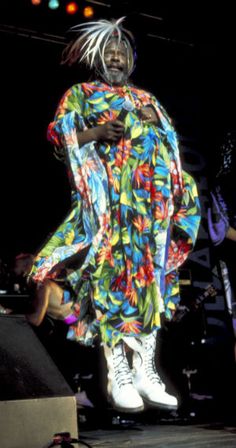 a woman standing on top of a stage