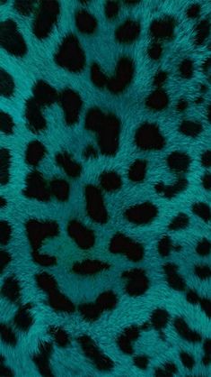 an animal print pattern is shown in green and black colors, as well as dark spots